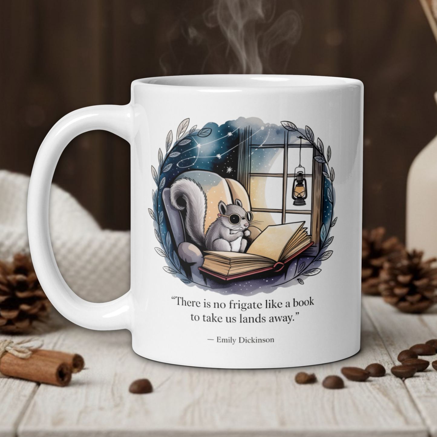 White mug with a squirrel reading a book design, surrounded by coffee beans and a vase.