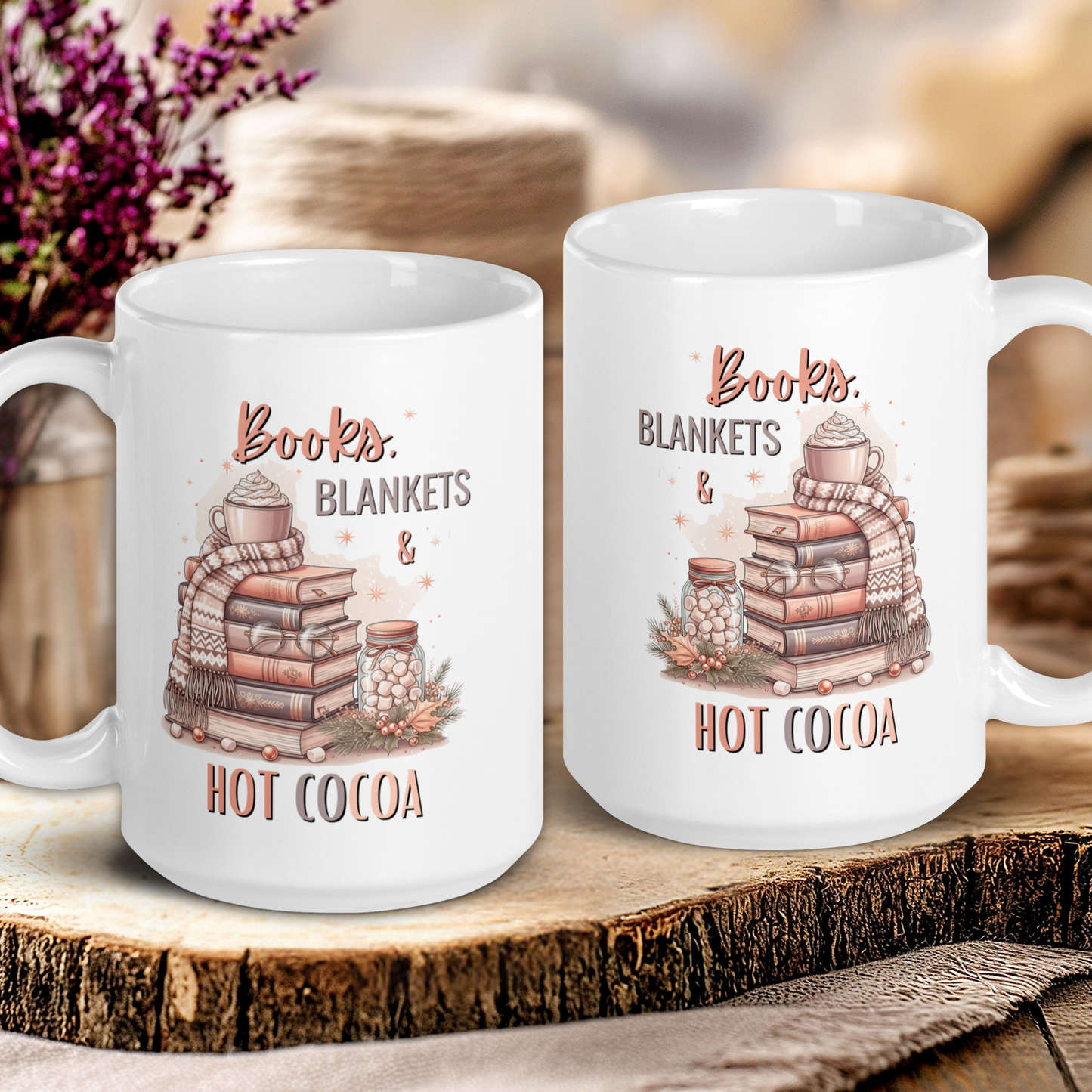 Two white mugs with book-themed designs on a wooden surface.