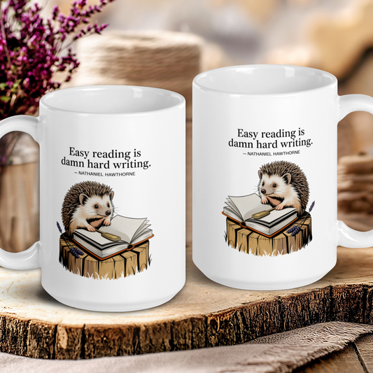 Two white mugs with hedgehog illustrations and text on a wooden surface.