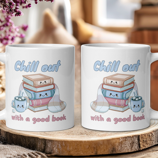 Two mugs with 'Chill out with a good book' design on a wooden surface.