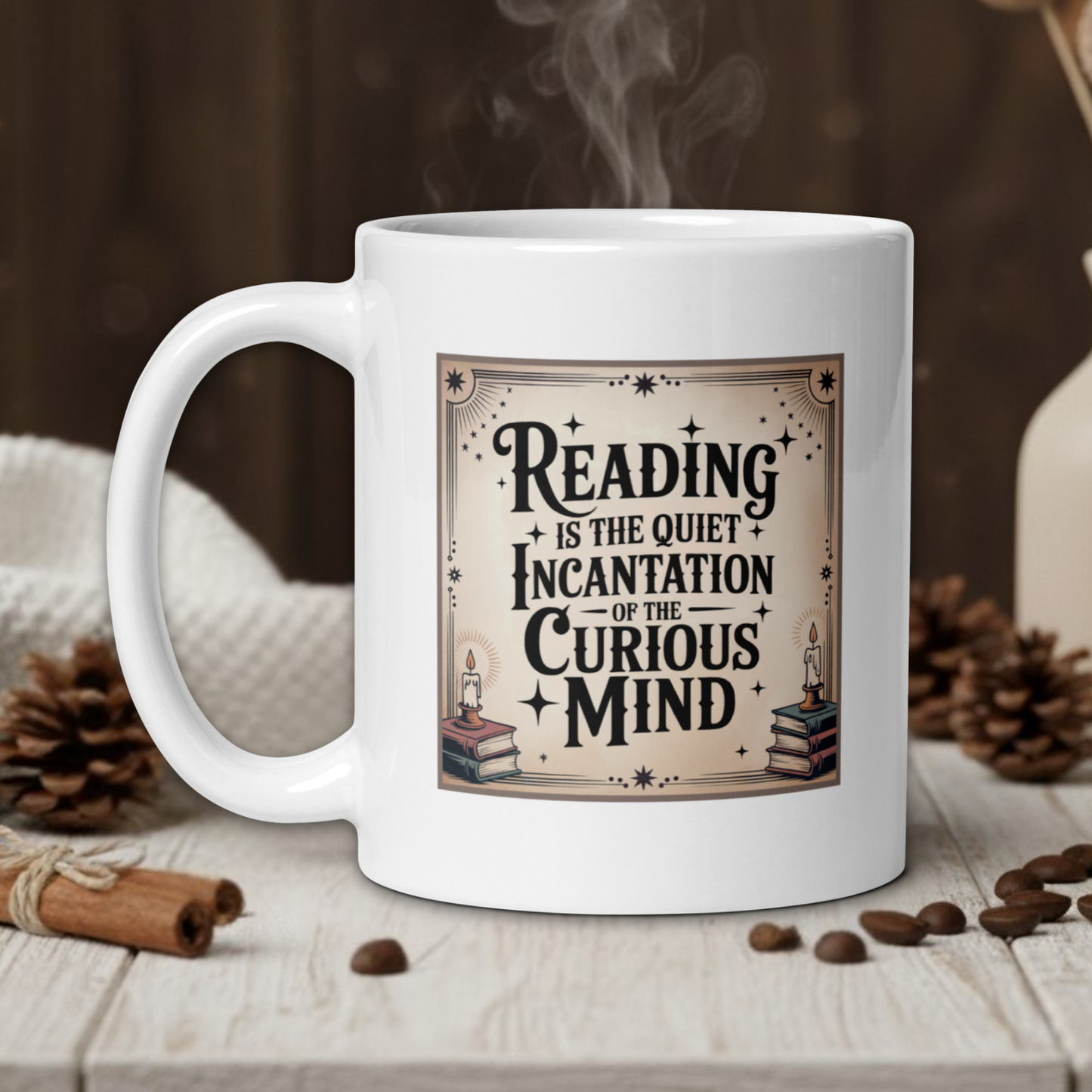 White mug with a motivational quote on a wooden table with coffee beans and a vase in the background