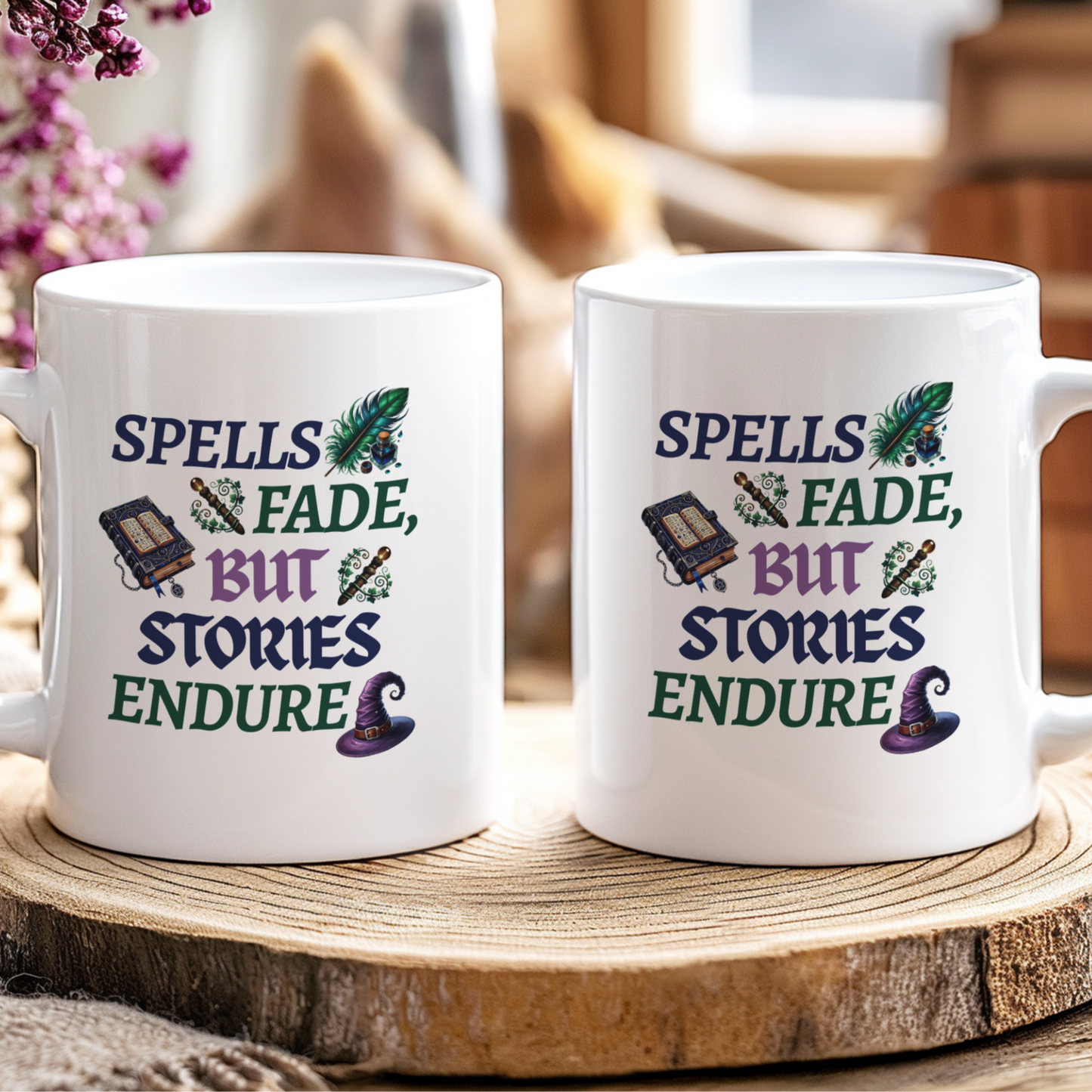Two white mugs with decorative text on a wooden surface with blurred background