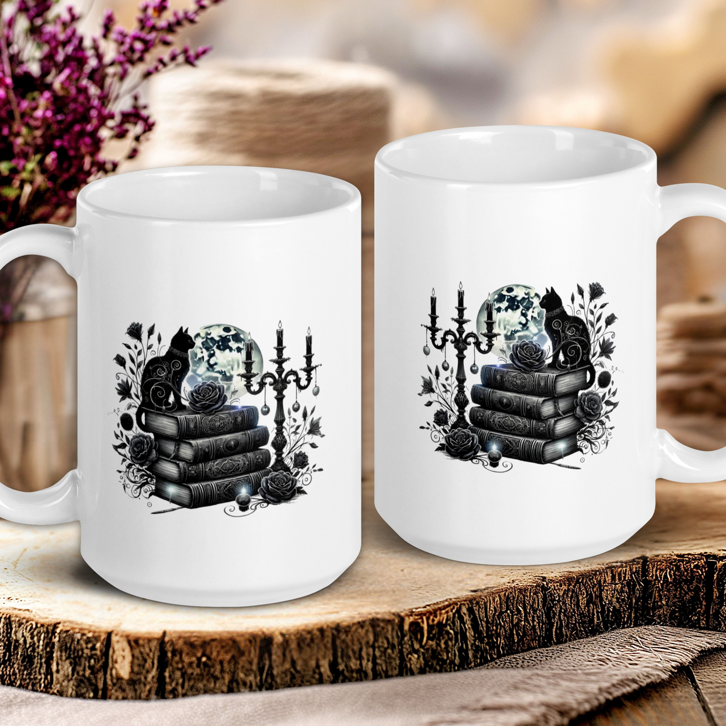 Two white mugs with black illustrations of cats on books on a wooden surface.