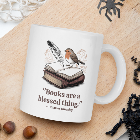 Mug with a bird illustration and quote on a wooden surface