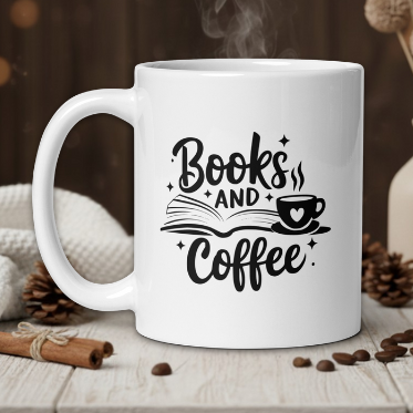 White mug with 'Books and Coffee' text on a wooden table with coffee beans and a vase in the background.