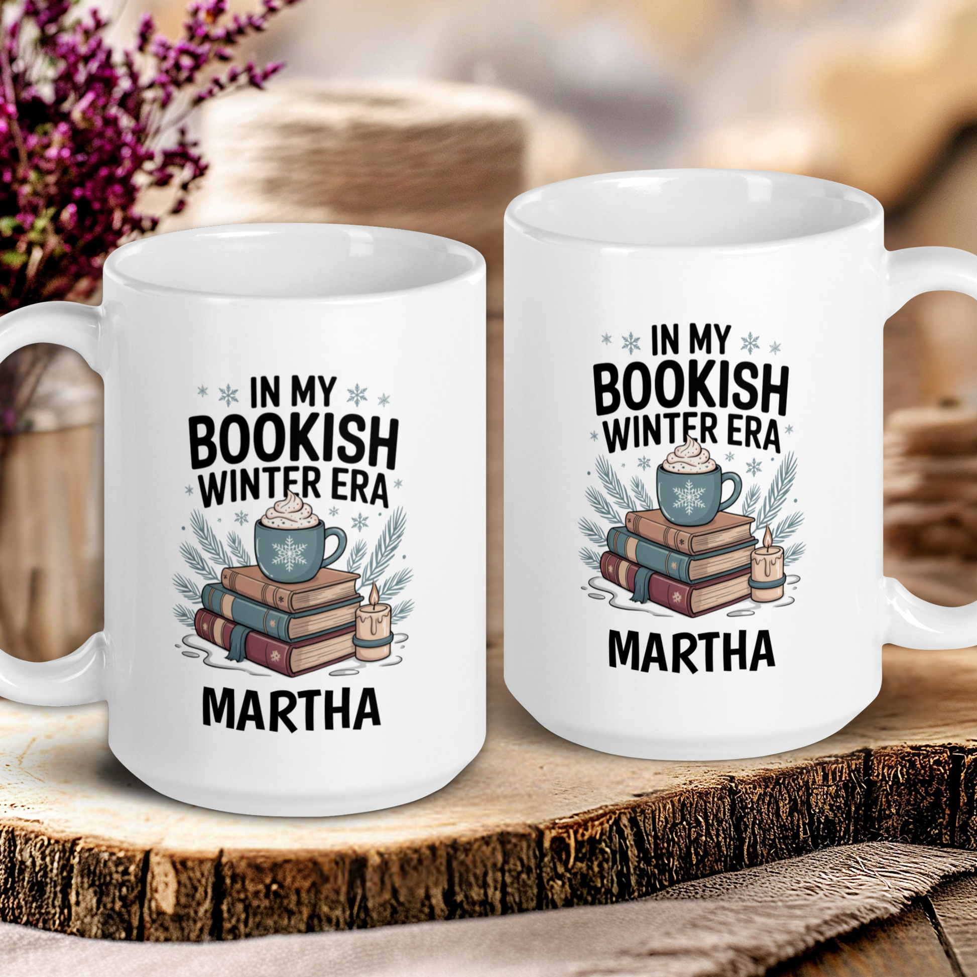 Two white mugs with book-themed designs and text on a wooden surface.