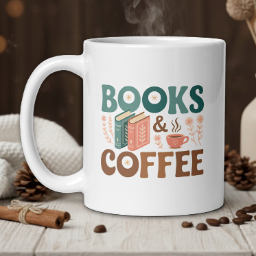 White mug with 'Books & Coffee' design on a wooden table with coffee beans and a vase in the background.