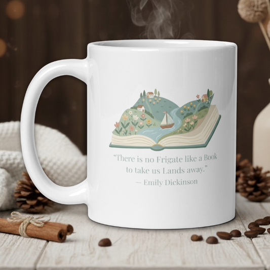 White mug with a scenic design and quote, steaming on a wooden table with coffee beans and a vase.