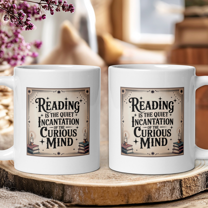 Two white mugs with a decorative text design on a wooden surface.