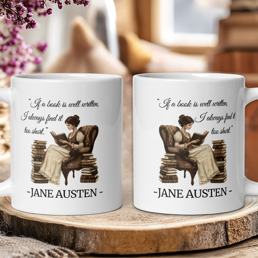 Two Jane Austen-themed mugs with a quote and illustration of a woman reading on a wooden surface.