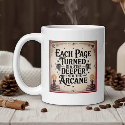 White mug with a decorative label on a wooden table with coffee beans and a vase in the background