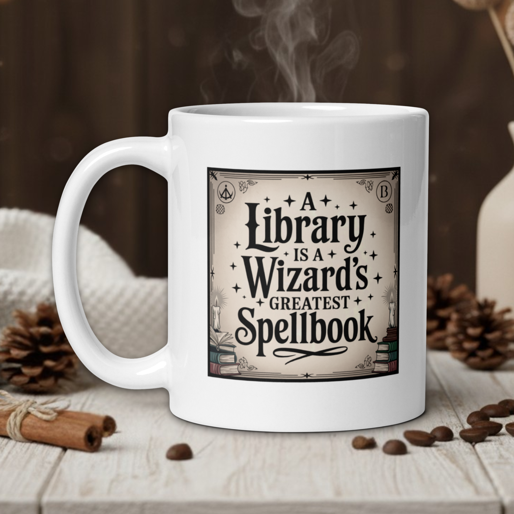 White mug with a decorative design and text on a wooden table with coffee beans and a vase.