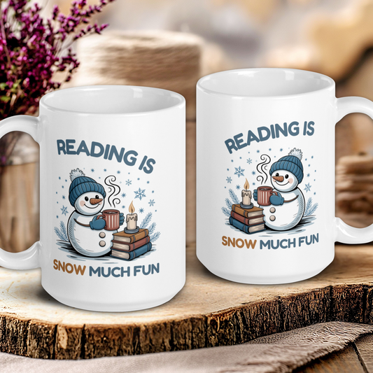 Two white mugs with snowman design and text on a wooden surface.