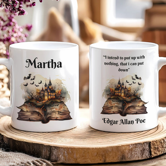 Two mugs with Halloween-themed designs and text on a wooden surface.
