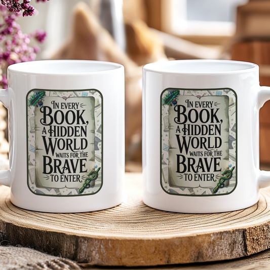 Two white mugs with a motivational quote on a wooden surface with a blurred background