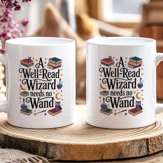 Two white mugs with 'A Well Read Wizard needs no Wand' text on a wooden surface.