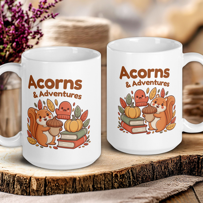 Two white mugs with 'Acorns & Adventures' design on a wooden surface.