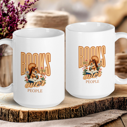 Two white mugs with 'Books Over People' design on a wooden surface.