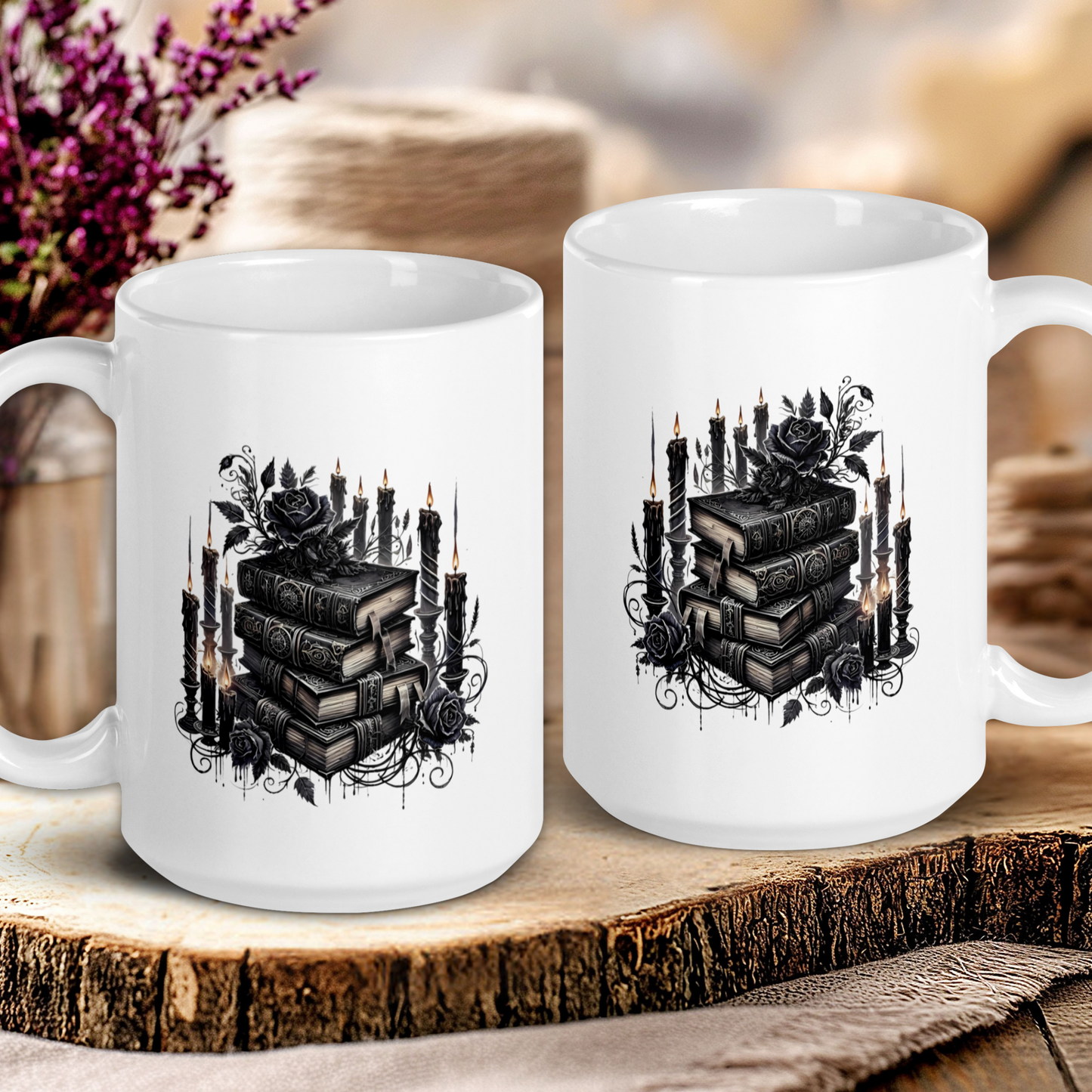 Two white mugs with black book and rose design on a wooden surface.
