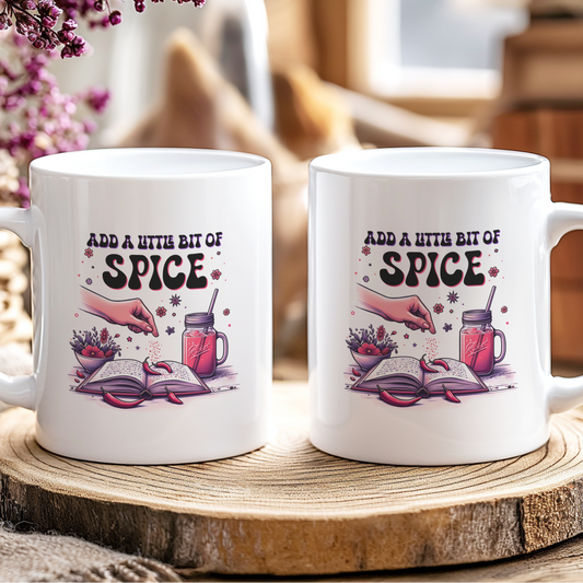 Two white mugs with decorative text and illustrations on a wooden coaster.