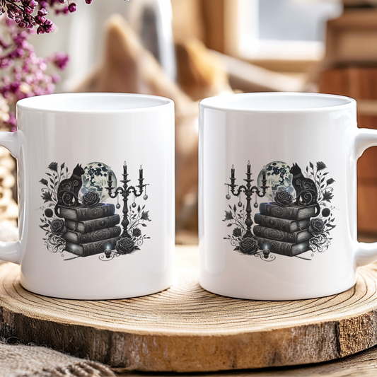 Two white mugs with black designs on a wooden coaster, surrounded by flowers and jars.