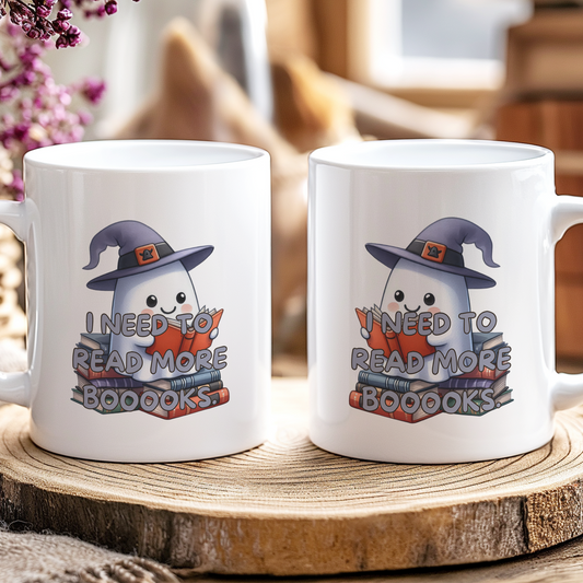 Two mugs with ghost illustrations and text on a wooden coaster.