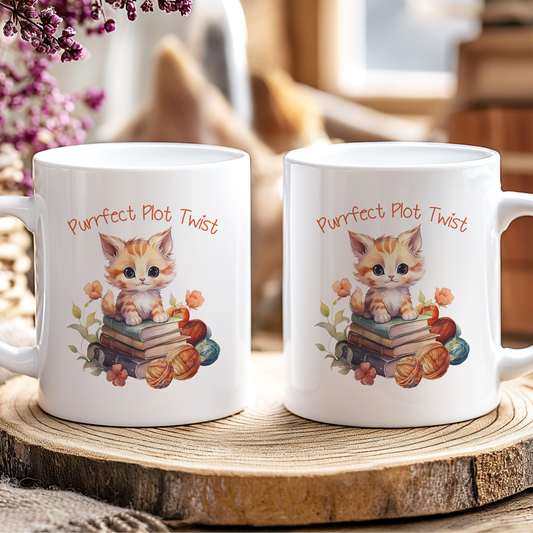 Two white mugs with a cat illustration and text on a wooden coaster.