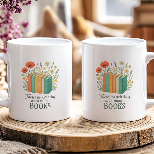 Two white mugs with book-themed design on a wooden coaster.