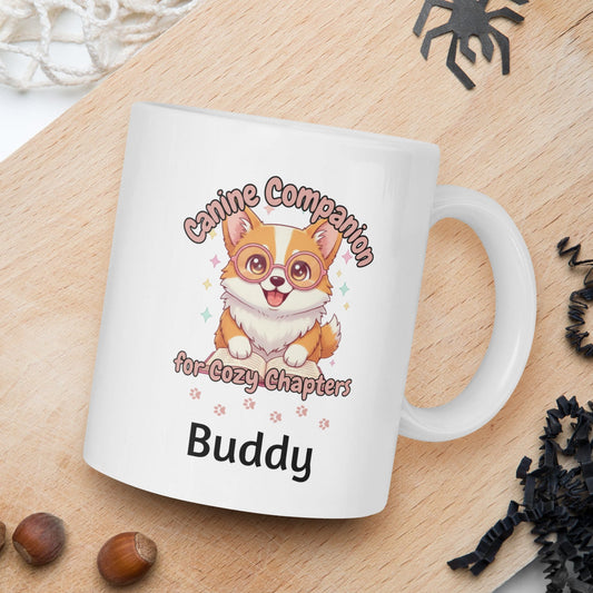 White mug with a corgi design and text on a wooden board with nuts and spider decorations.