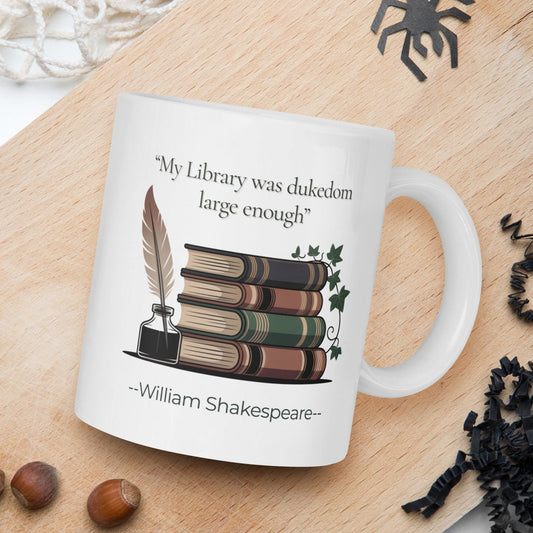 Mug with Shakespeare quote on a wooden board with nuts and spider decorations